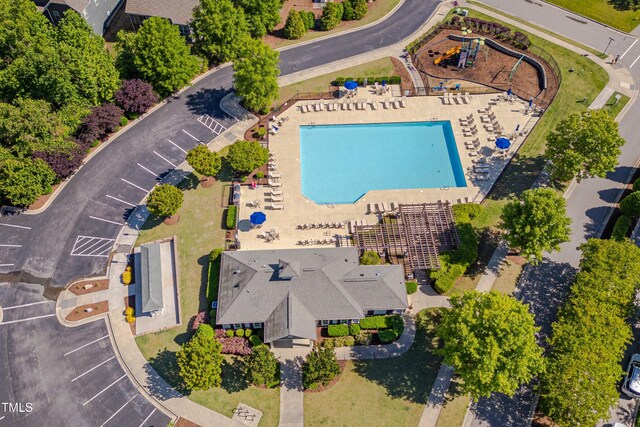 drone / aerial view of a pool area