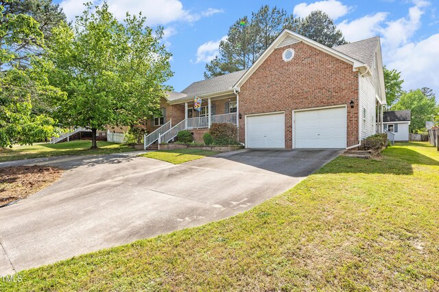 ranch-style house featuring concrete driveway, brick siding, a porch, a front lawn, and an attached garage
