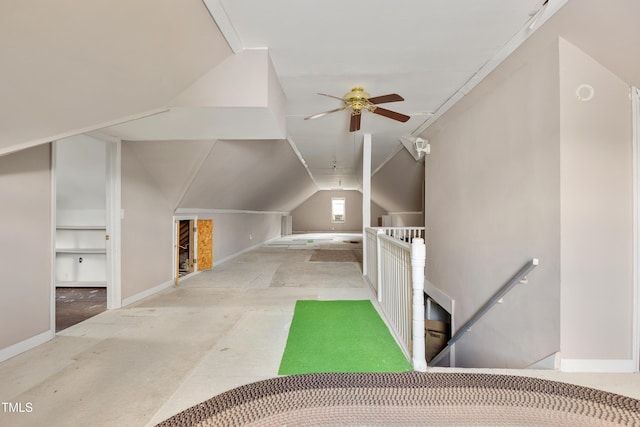 bonus room featuring lofted ceiling and ceiling fan