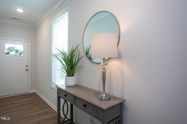 1048 Flagler St, Durham, NC 27713 - entrance foyer with dark wood finished floors, ornamental molding, and baseboards