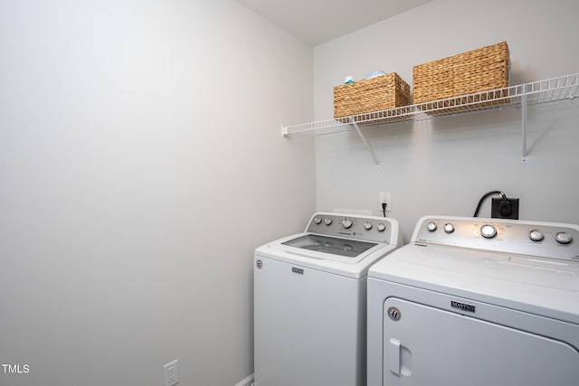 1048 Flagler St, Durham, NC 27713 - washroom with independent washer and dryer and baseboards