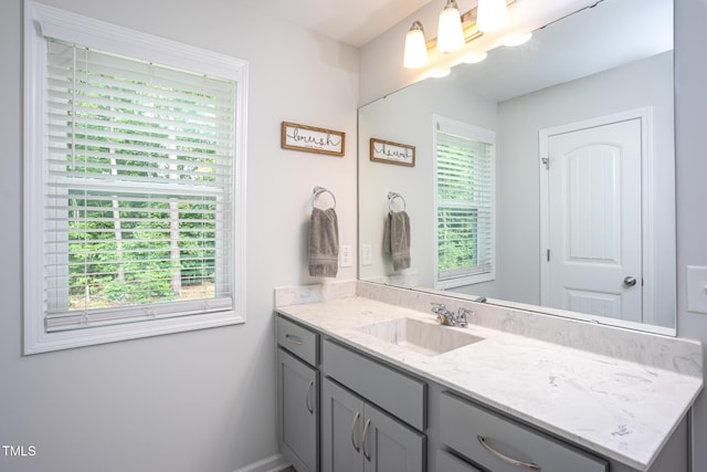 1048 Flagler St, Durham, NC 27713 - bathroom with vanity and baseboards