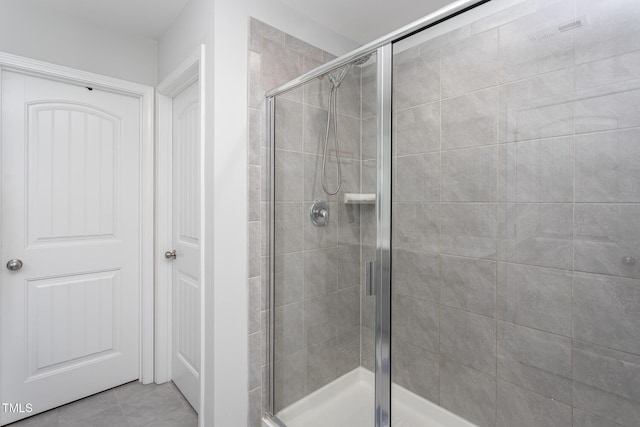 1048 Flagler St, Durham, NC 27713 - full bath featuring a stall shower and tile patterned floors