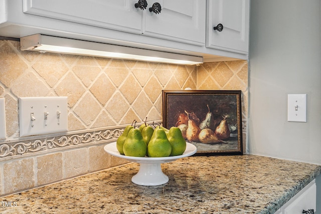 101 Parkbow Ct, Cary, NC 27519 - kitchen view of white cabinets, light stone countertops, and decorative backsplash
