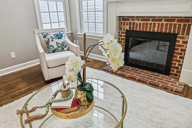 101 Parkbow Ct, Cary, NC 27519 - living area with a fireplace and wood finished floors