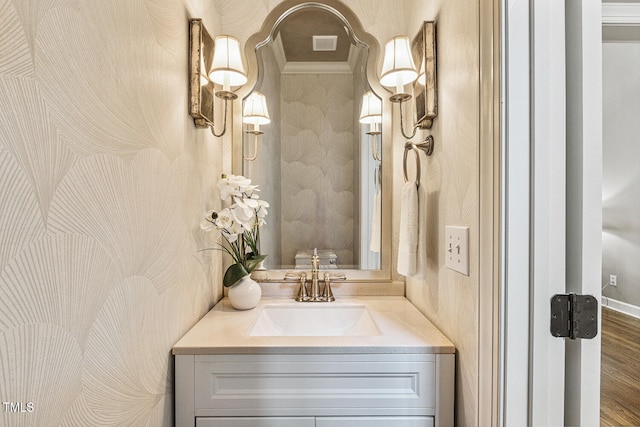 101 Parkbow Ct, Cary, NC 27519 - bathroom featuring vanity, wood finished floors, and crown molding
