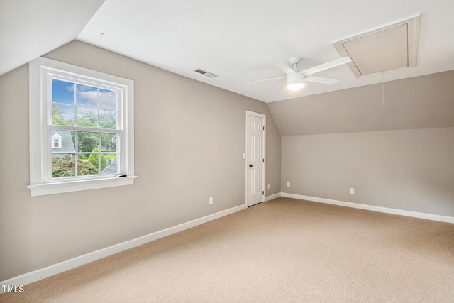101 Parkbow Ct, Cary, NC 27519 - additional living space with attic access, lofted ceiling, a ceiling fan, and light colored carpet