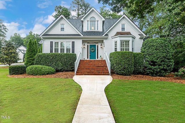 101 Parkbow Ct, Cary, NC 27519 - view of front of home with a front lawn and roof with shingles