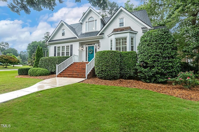 101 Parkbow Ct, Cary, NC 27519 - view of front of house featuring a front yard and roof with shingles