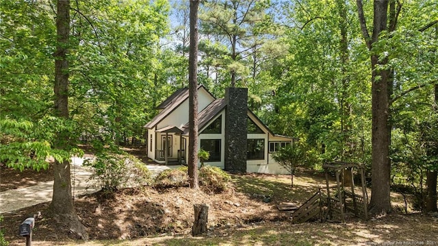 view of home's exterior featuring a chimney