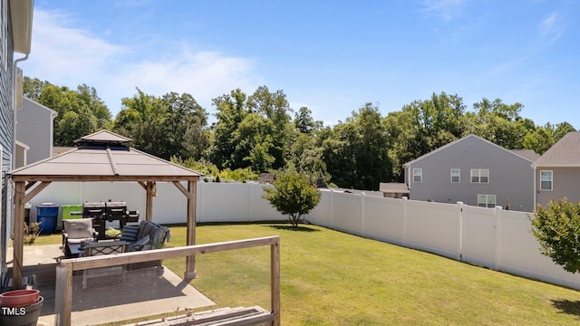 view of yard with a gazebo and a patio