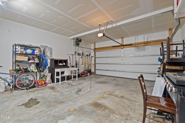 garage featuring a garage door opener