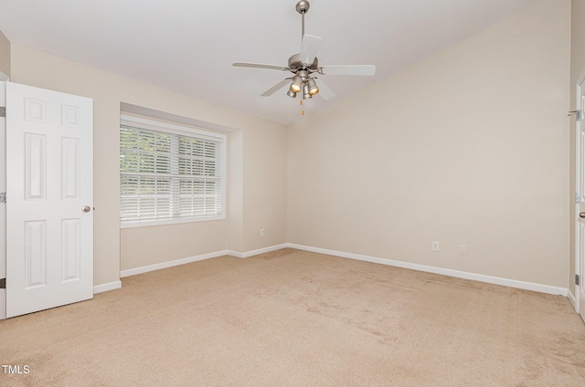2111 Piney Brook Rd Unit 101, Raleigh, NC 27614 - spare room with light carpet, ceiling fan, and vaulted ceiling
