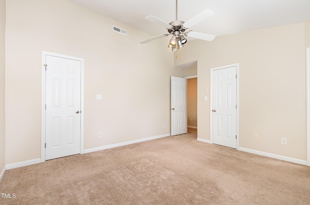 2111 Piney Brook Rd Unit 101, Raleigh, NC 27614 - unfurnished bedroom with high vaulted ceiling, light colored carpet, and ceiling fan