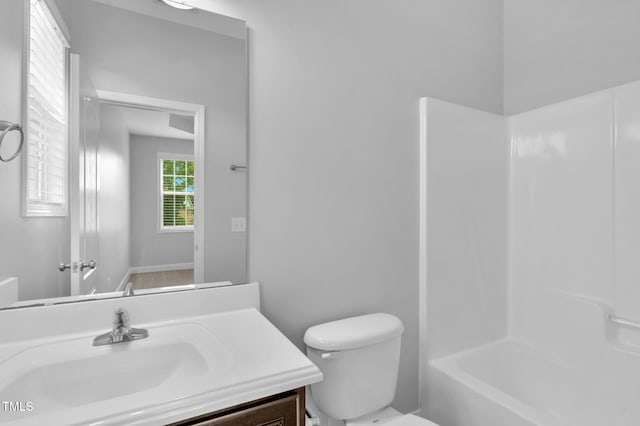 2808 Sand Trap Ln, Hope Mills, NC 28348 - full bathroom with toilet, vanity, and tub / shower combination