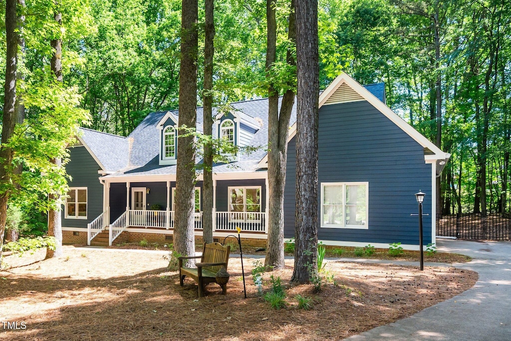 206 Lilliput Ln, Wake Forest, NC 27587 - view of front of property with crawl space, covered porch, and a shingled roof