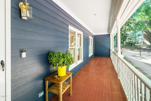 wooden terrace with a porch