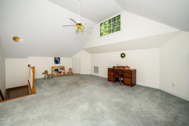 bonus room featuring vaulted ceiling, carpet floors, baseboards, and a ceiling fan