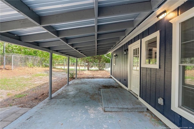 view of patio featuring fence