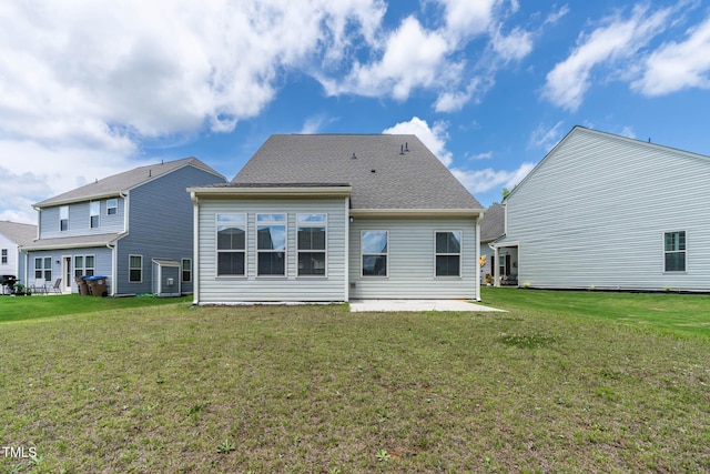 1745 Ripley Woods St, Wake Forest, NC 27587 - rear view of house with a patio and a yard