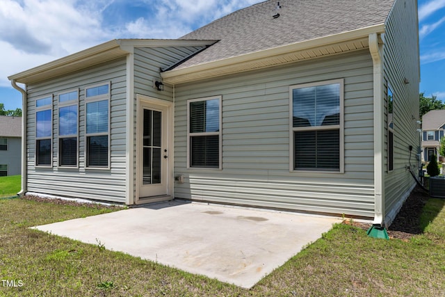 1745 Ripley Woods St, Wake Forest, NC 27587 - back of property featuring a patio area, a yard, and roof with shingles