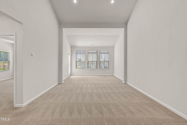 1745 Ripley Woods St, Wake Forest, NC 27587 - unfurnished room featuring light colored carpet, plenty of natural light, and recessed lighting