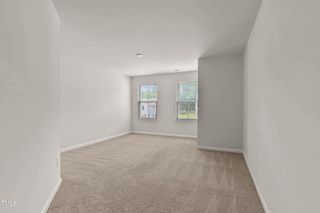 1745 Ripley Woods St, Wake Forest, NC 27587 - empty room featuring light colored carpet and baseboards