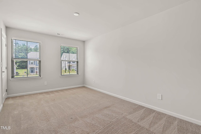 1745 Ripley Woods St, Wake Forest, NC 27587 - spare room with baseboards and light carpet