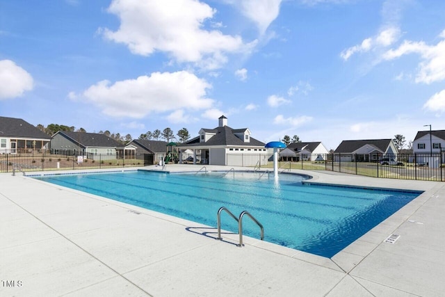 1913 Ballard Rd Unit 193, Fuquay Varina, NC 27526 - community pool with fence, a residential view, and a patio area