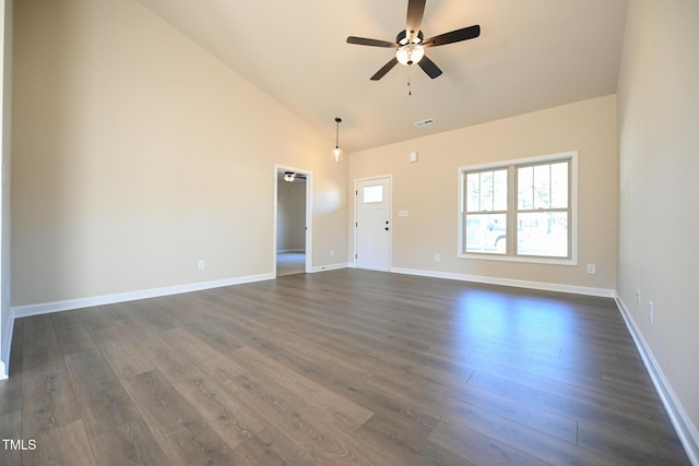 unfurnished living room featuring a ceiling fan, dark wood-style flooring, baseboards, and high vaulted ceiling