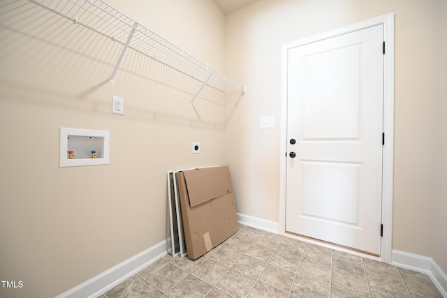 washroom featuring electric dryer hookup, hookup for a washing machine, and baseboards