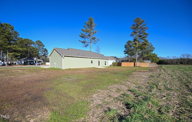 view of yard with fence