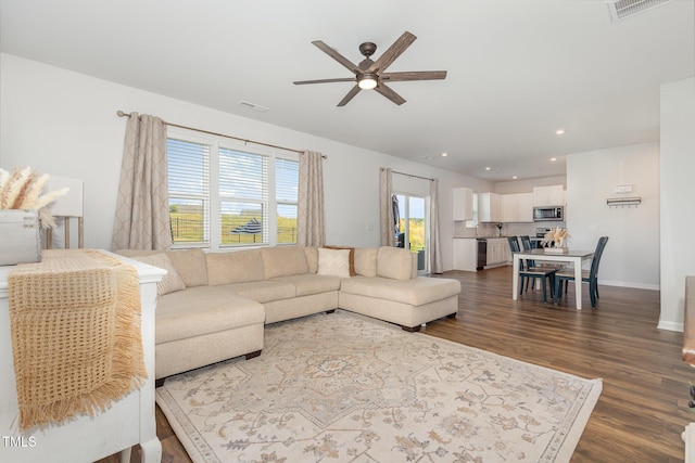 19 Cecina Ct, Clayton, NC 27527 - living area featuring ceiling fan, dark wood-style flooring, recessed lighting, and baseboards