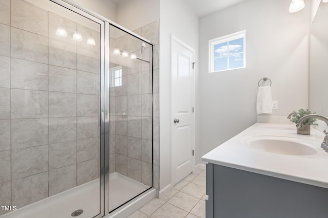 19 Cecina Ct, Clayton, NC 27527 - bathroom with a stall shower, tile patterned floors, and double vanity