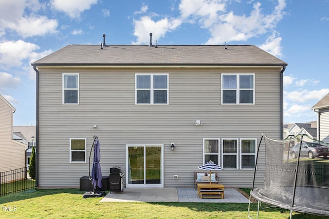 19 Cecina Ct, Clayton, NC 27527 - rear view of house featuring a trampoline, a patio area, and roof with shingles