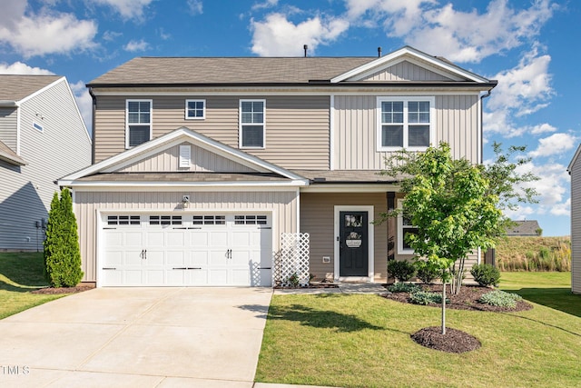 19 Cecina Ct, Clayton, NC 27527 - view of front of property featuring a front lawn, driveway, an attached garage, and board and batten siding