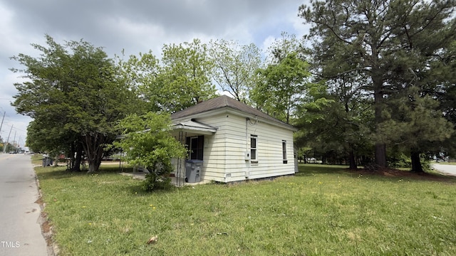 752 Nashville Rd, Rocky Mount, NC 27803 - view of home's exterior with a yard