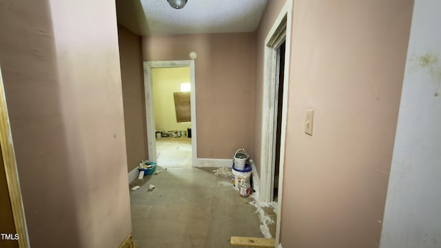 752 Nashville Rd, Rocky Mount, NC 27803 - hall featuring baseboards and a textured ceiling