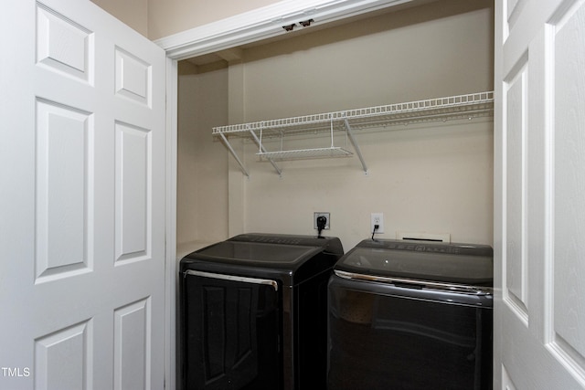 laundry area featuring independent washer and dryer