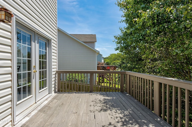 wooden terrace featuring french doors