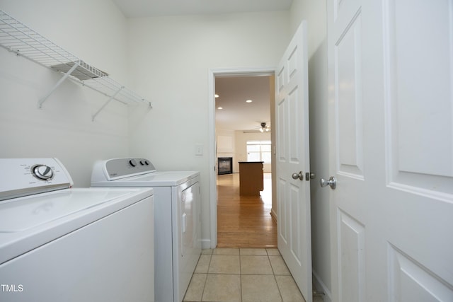 washroom with washing machine and clothes dryer, light tile patterned flooring, ceiling fan, and recessed lighting