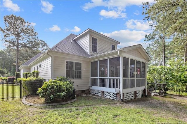 631 Anderson Creek Dr, Spring Lake, NC 28390 - back of property with a sunroom, roof with shingles, and crawl space
