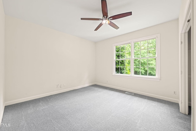 1514 Lawrence Rd, Creedmoor, NC 27522 - empty room featuring baseboards, carpet, and a ceiling fan