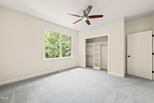 1514 Lawrence Rd, Creedmoor, NC 27522 - unfurnished bedroom with carpet flooring, baseboards, a closet, and a ceiling fan