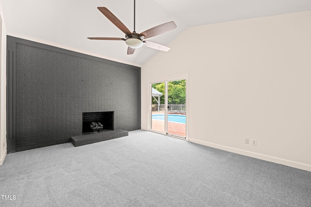 1514 Lawrence Rd, Creedmoor, NC 27522 - unfurnished living room with a ceiling fan, a fireplace, carpet flooring, high vaulted ceiling, and baseboards