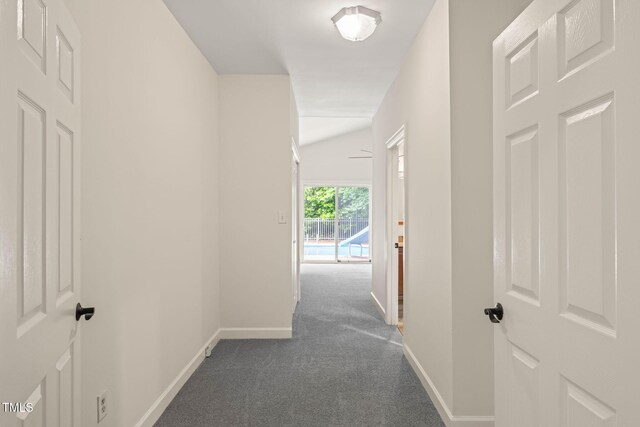 1514 Lawrence Rd, Creedmoor, NC 27522 - hallway featuring dark carpet and baseboards