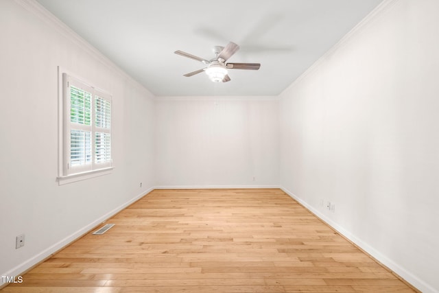 1514 Lawrence Rd, Creedmoor, NC 27522 - empty room featuring ornamental molding, ceiling fan, hardwood / wood-style flooring, and baseboards