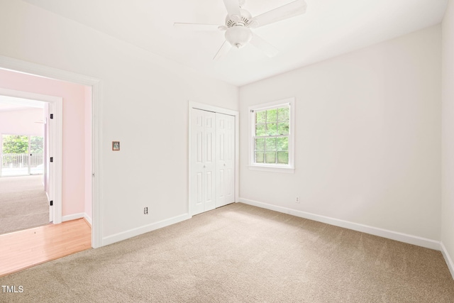 1514 Lawrence Rd, Creedmoor, NC 27522 - unfurnished bedroom featuring carpet floors, baseboards, a closet, and a ceiling fan