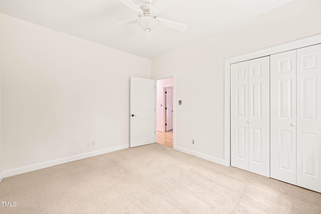 1514 Lawrence Rd, Creedmoor, NC 27522 - unfurnished bedroom featuring carpet flooring, baseboards, a closet, and ceiling fan