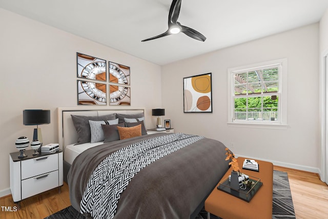 1514 Lawrence Rd, Creedmoor, NC 27522 - bedroom featuring wood finished floors, baseboards, and a ceiling fan